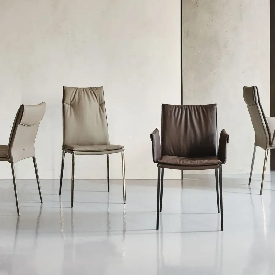 Distinguished Cattelan Italia Isabel chair crafted in Italy with brown and tan leather upholstery and slender exposed steel legs