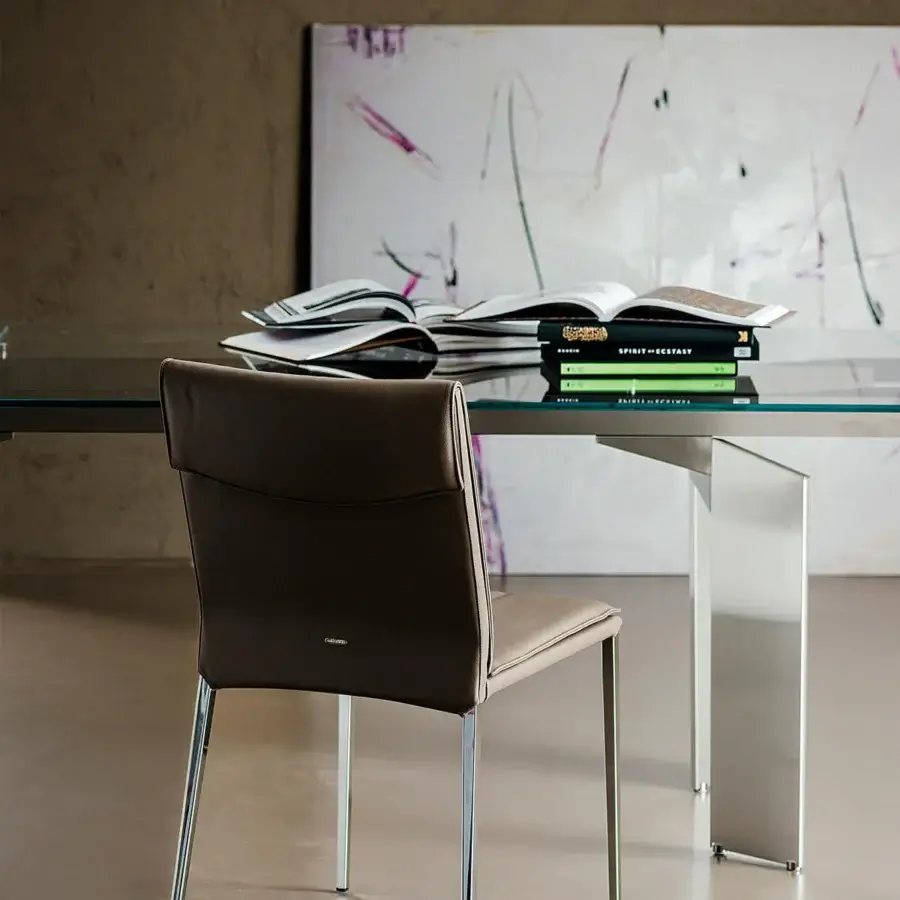 Elegant Cattelan Italia Isabel chair with light brown upholstery and slender exposed steel legs crafted in Italy