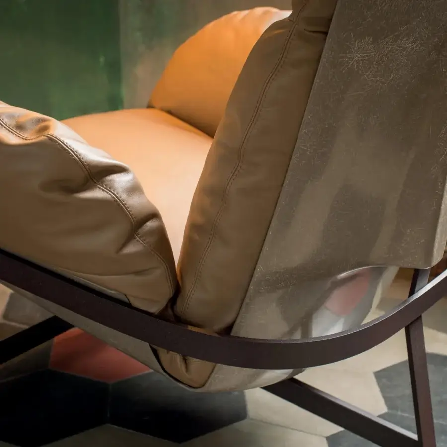 Distinguished Arketipo Jupiter lounge chair with a light tan leather-like material and dark brown matte metal frame