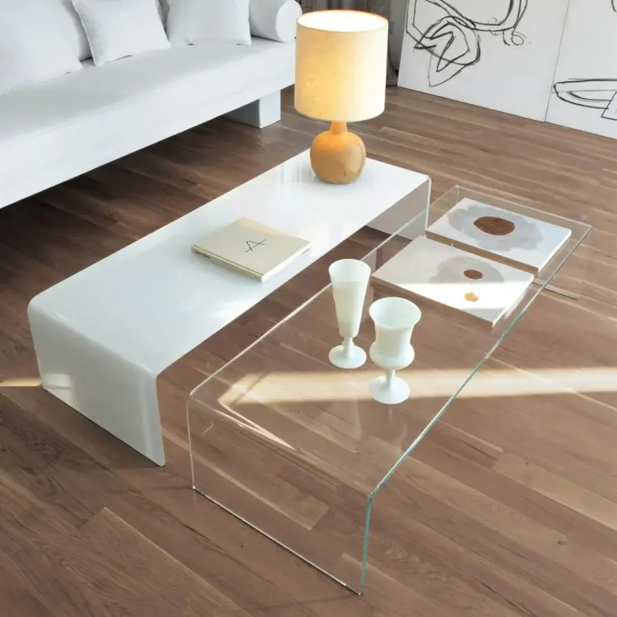 Distinguished Sovet Italia Bridge coffee table crafted in transparent glass with a glossy continuous curved form