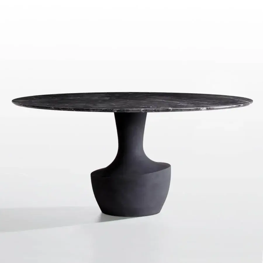 Distinguished Potocco Anfora table with sculpted pedestal and polished dark gray marble exhibiting white veining