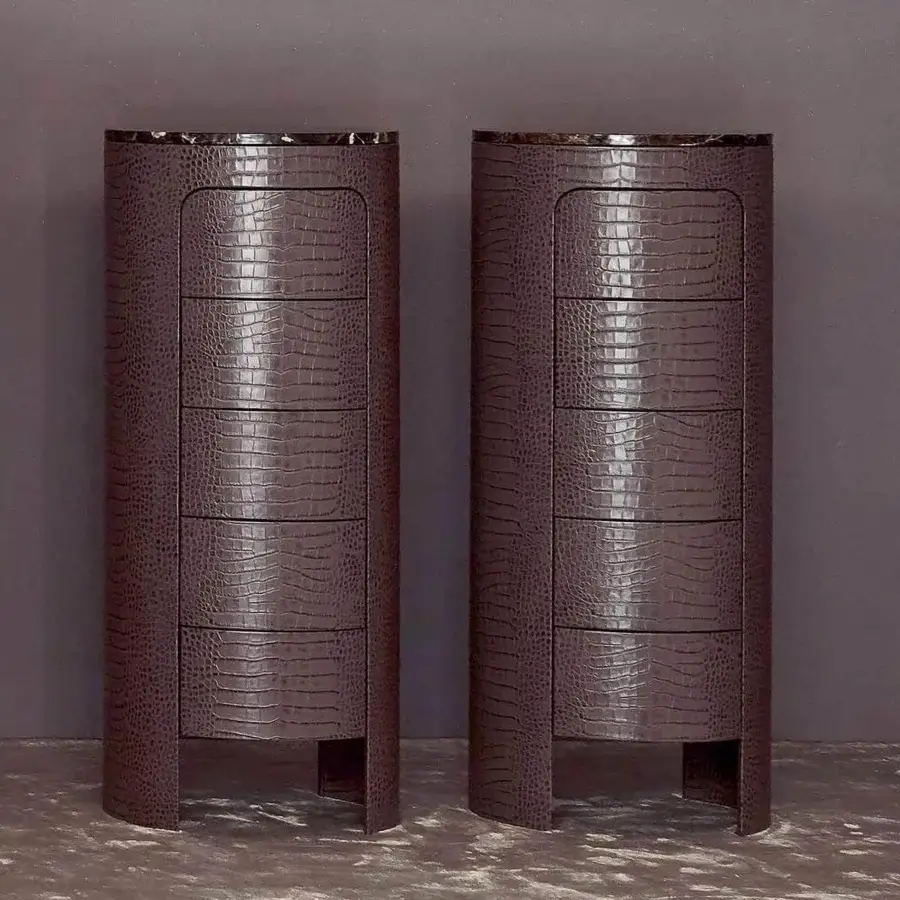 Exceptional Rugiano Vogue dresser with textured leather enveloping a cylindrical form and dark marble top