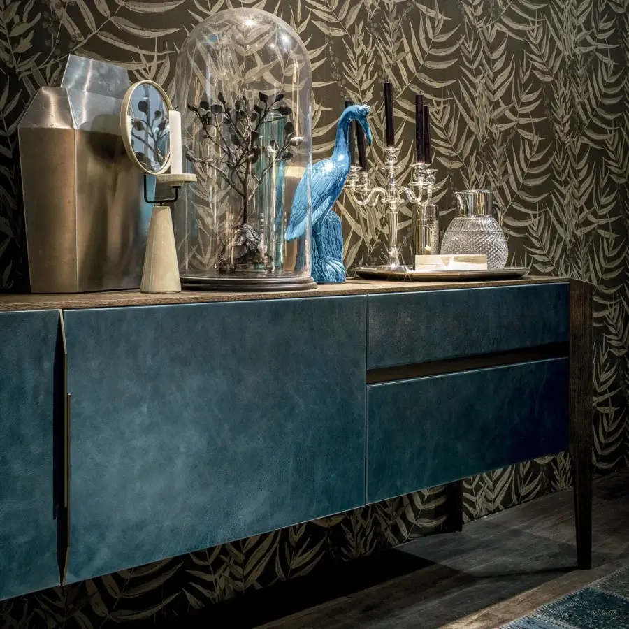 Distinguished Arketipo Glory sideboard crafted in dark teal leather with slender legs and unique vertical handled doors