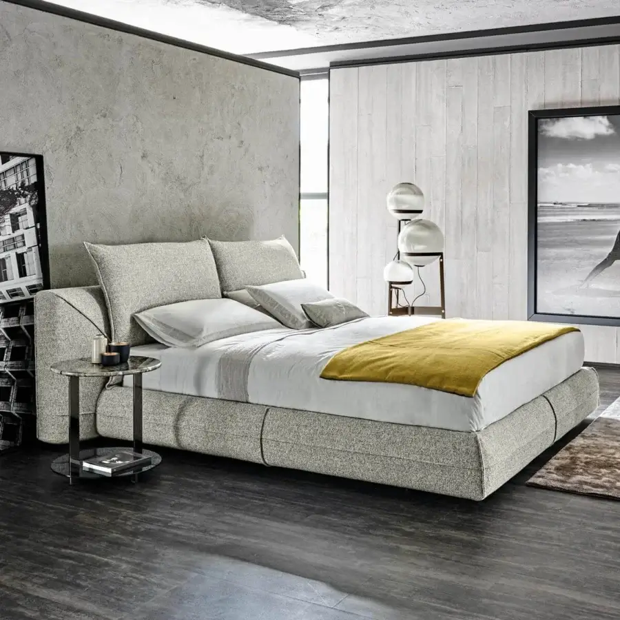 Sophisticated Arketipo Starman Dream bed with neutral gray textile upholstery and matte finish creating a low platform profile