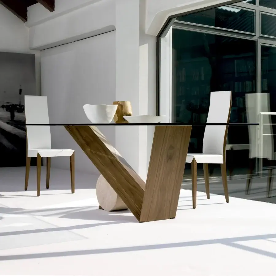 Distinctive Cattelan Italia Valentino table with clear glass and a Canaletto walnut V-shaped base in matte finish
