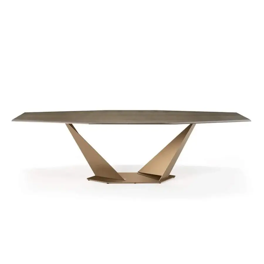 Distinguished Reflex Quartz table with substantial stone-like tabletop and satin bronze metal V-shaped base crafted in Italy