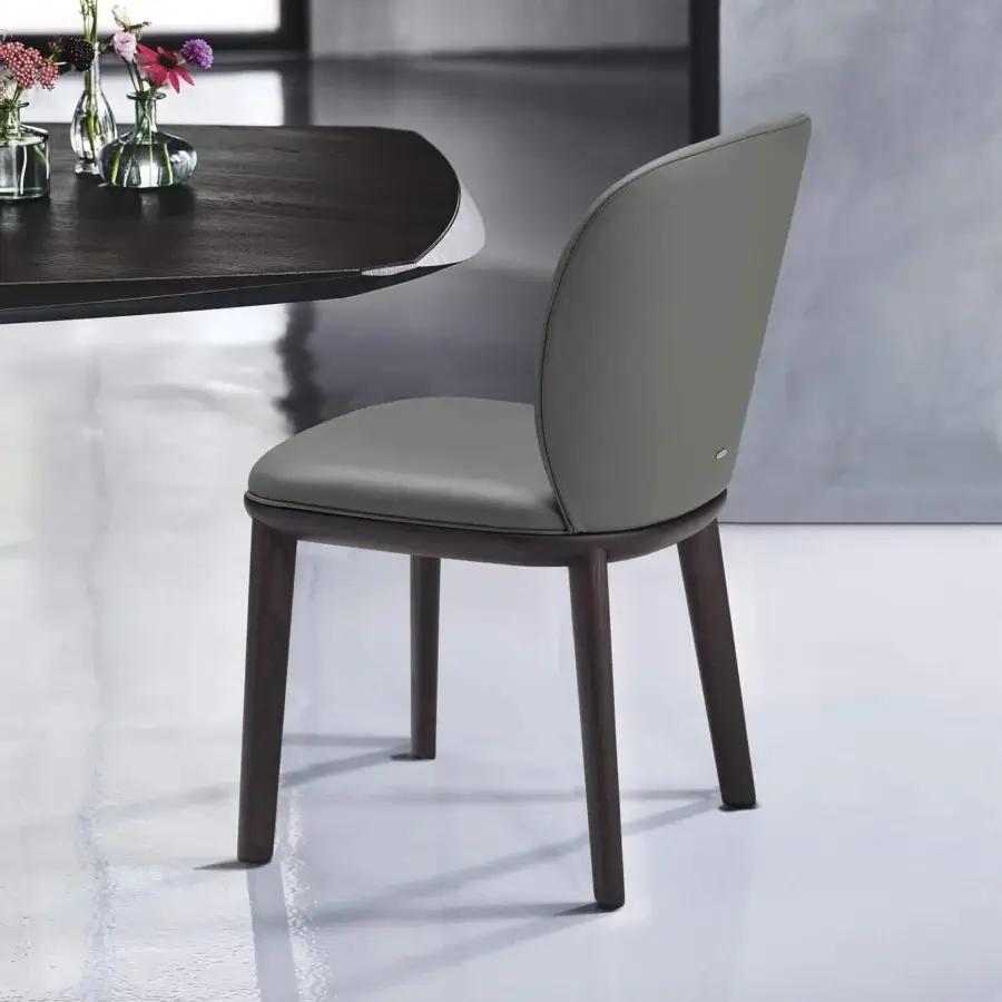 Harmonious Cattelan Italia Chris chair with natural ashwood base and muted grey-green fabric upholstery and satin finish