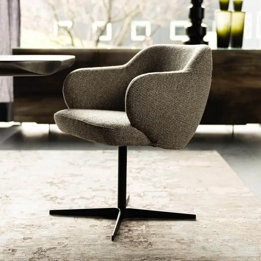 Sophisticated Cattelan Italia Bombè X armchair with muted gray textured fabric upholstery and embossed lacquered dark steel base
