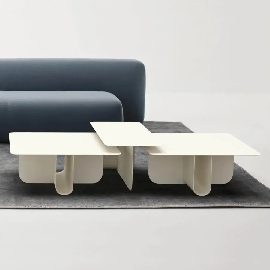 Distinguished LaCividina U coffee table crafted with bent aluminum and matte off-white tabletop exhibiting clean, subtly curved elements