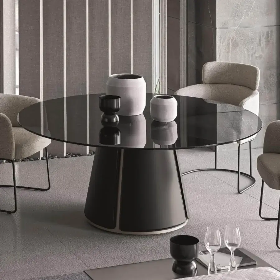 Distinguished Ditre Italia Claire table with circular clear glass and conical recycled bonded leather base in matte dark gray
