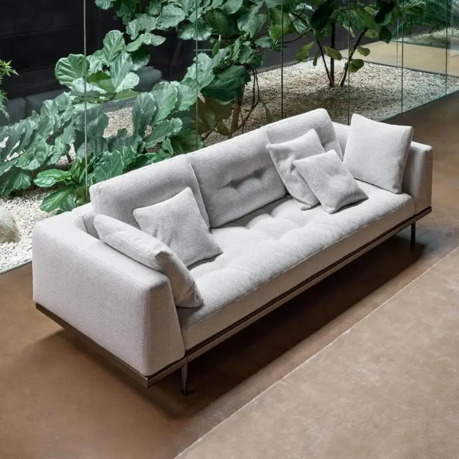 Refined Bonaldo Maximilian sofa with light gray textile upholstery and sleek matt varnished metal accenting a minimalist base
