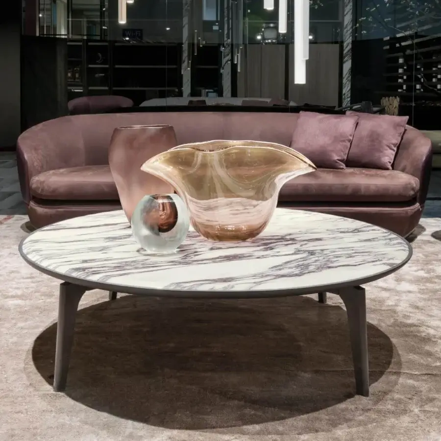 Elegant Giorgetti Blend coffee table with circular marble top and tapered ash wood legs in satin finish