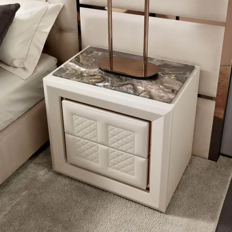 Sophisticated DV Home Collection Adler nightstand crafted in leather with marble tabletop and rose-gold trim exhibiting matt lacquered interiors