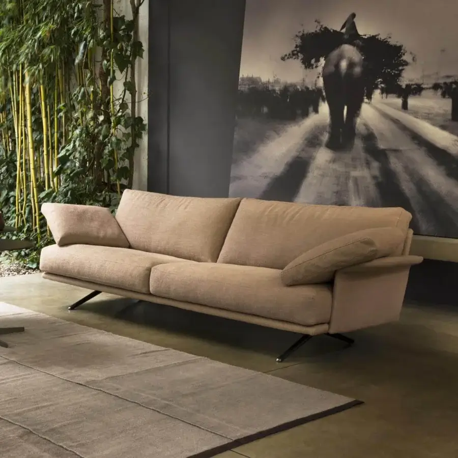 Distinguished Verzelloni Nilson sofa with curved armrests upholstered in textured light brown textile for designer living rooms