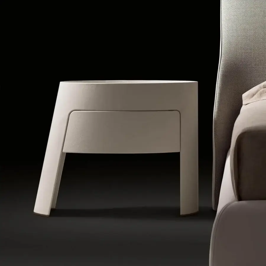 Refined Giorgetti Morfeo nightstand with rounded form in canaletto walnut and light beige matte finish
