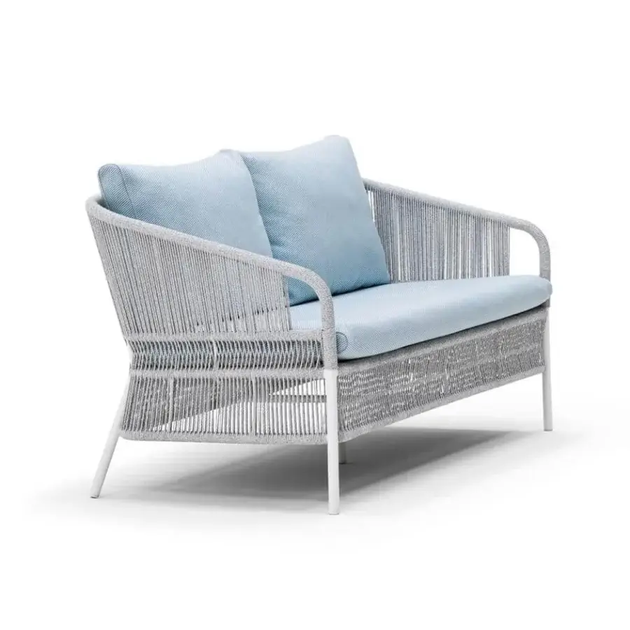 Distinguished Varaschin Cricket sofa with light gray handmade rope weaving and soft light blue cushions built with a light aluminum structure