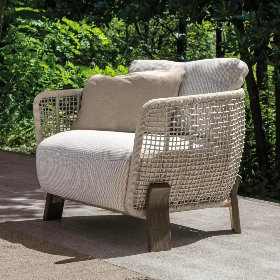 Stylish Talenti Argo Wood lounge chair with woven rope backrest and sculpted cushions in light weather-resistant fabric with dark brown wooden legs