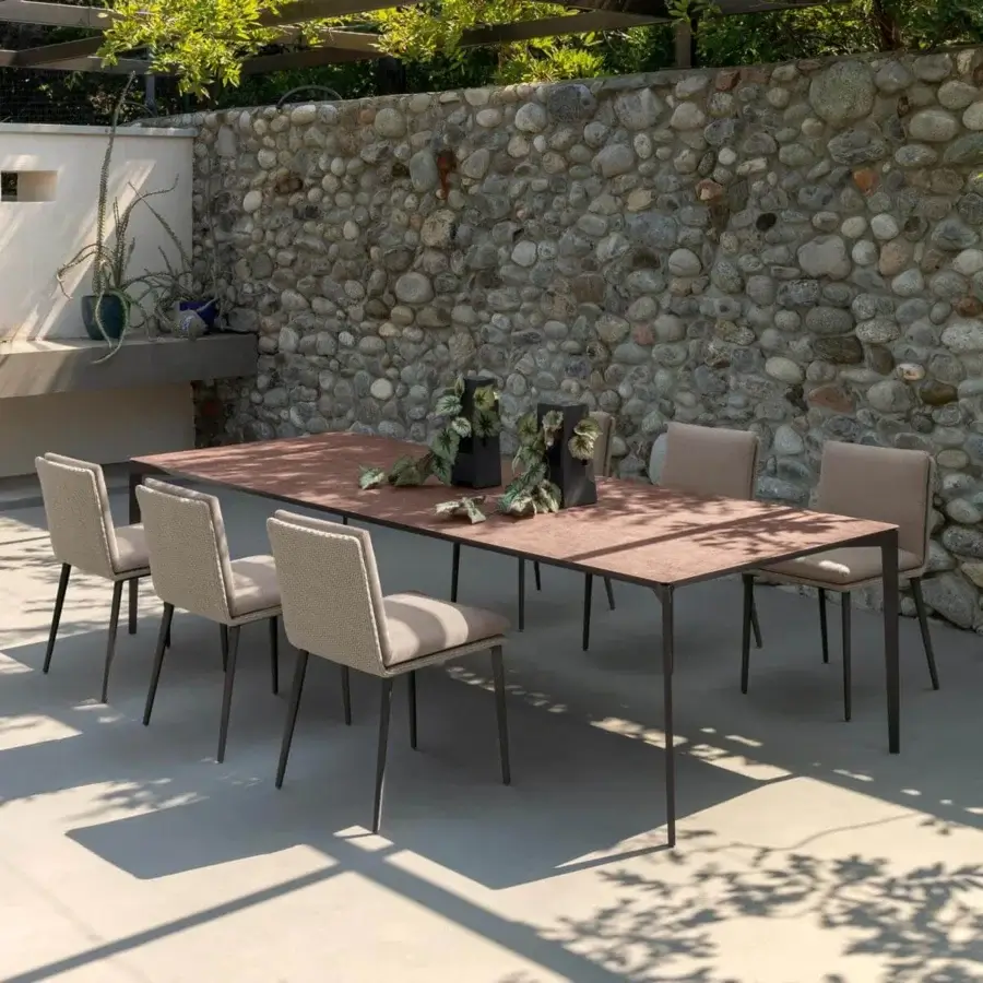 Superior Talenti Leaf table with a large rectangular Vitter top and dark metal frame crafted for outdoor dining