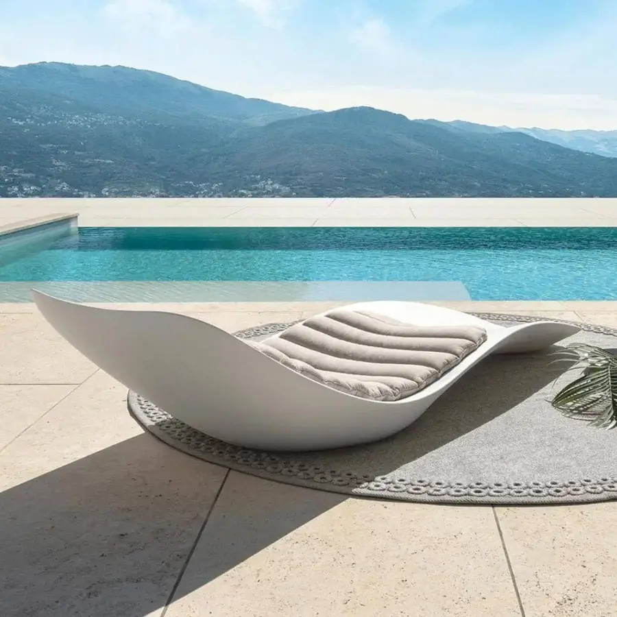 Exceptional Talenti Reef lounger crafted in resistant plastic with smooth matte finish and balanced form