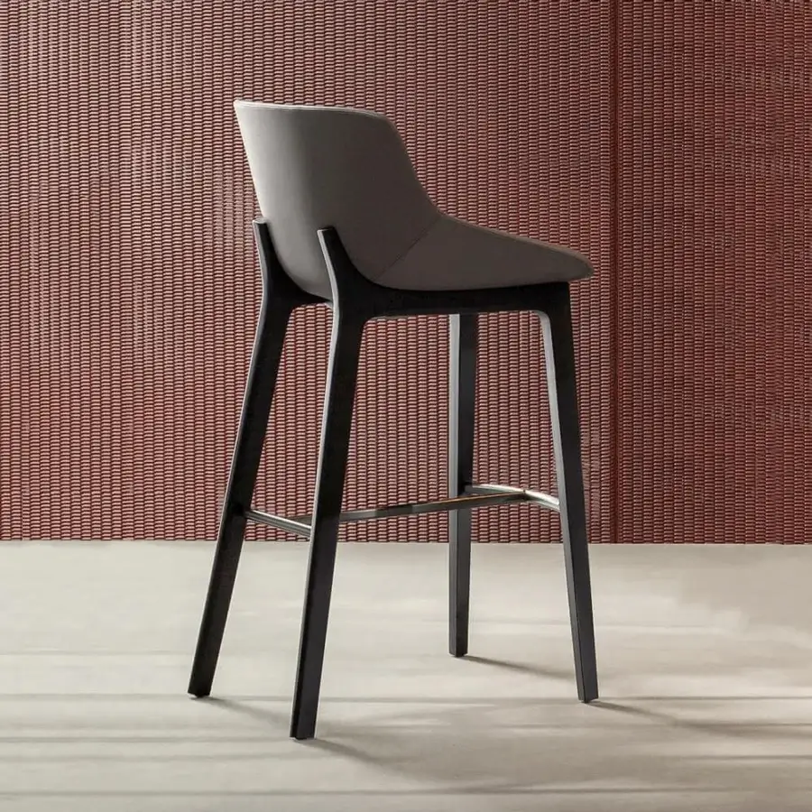 Superior Bonaldo Artika stool with smooth gray upholstery and dark-stained wood base crafted with a refined metal footrest