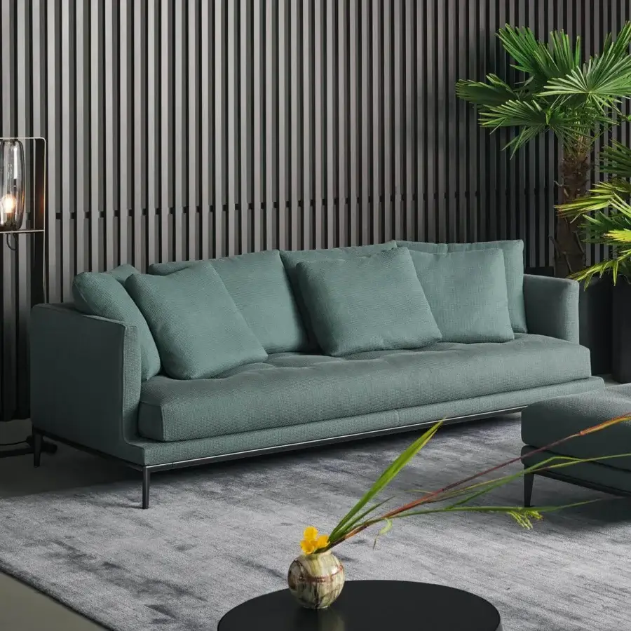 Superior Bonaldo Soft Island sofa with deep tufted seat in muted teal textile and subtle metal feet