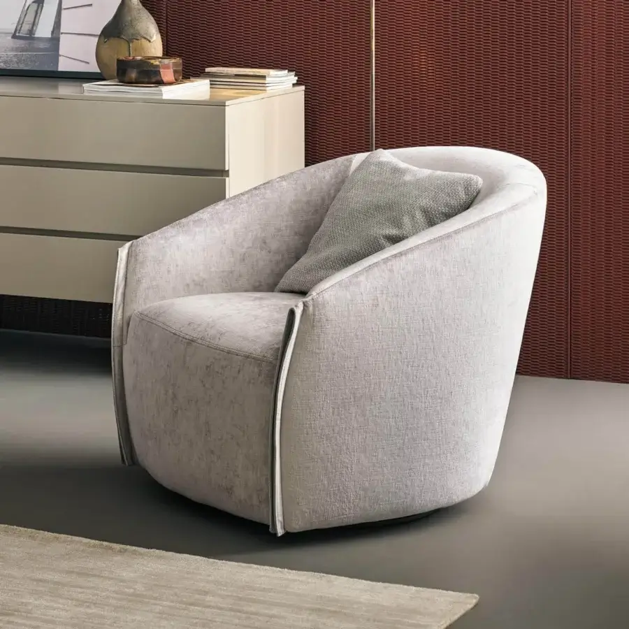 Superior Bonaldo Bodo lounge chair in light gray fabric with a textured matte finish and refined leather accents