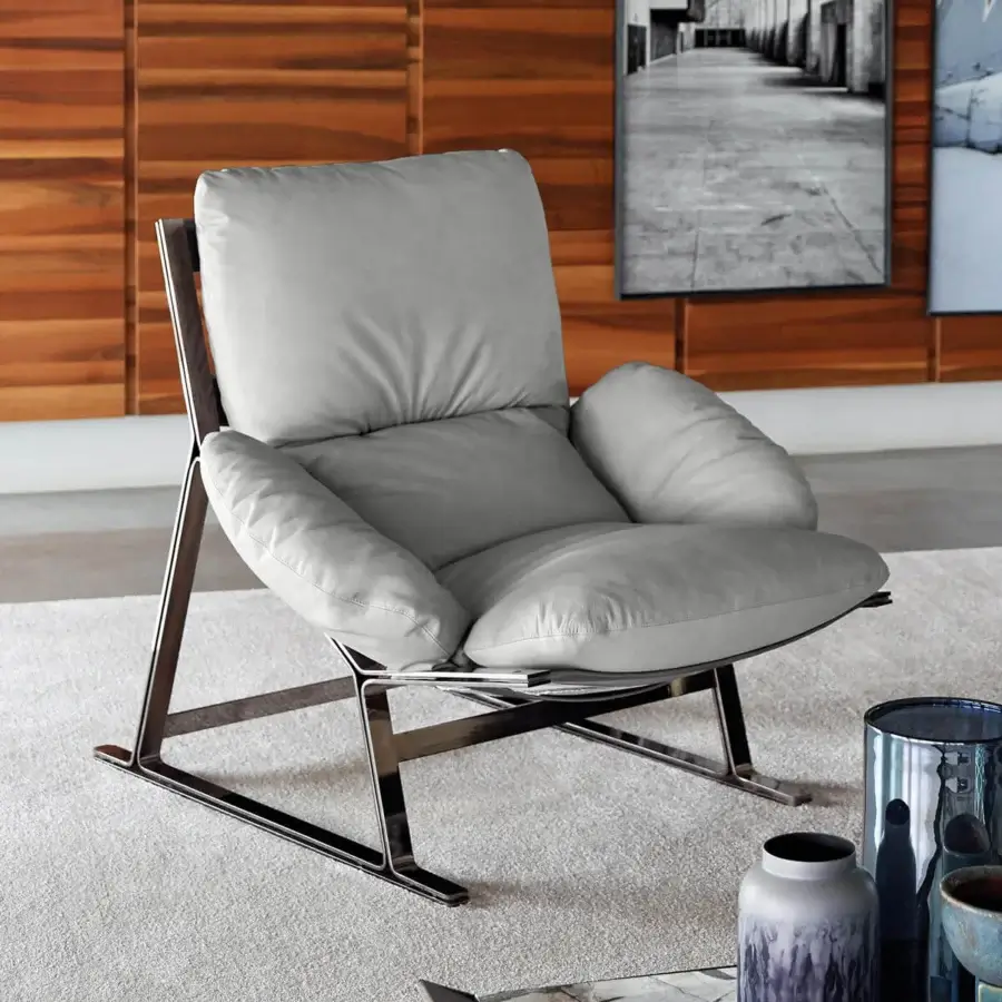 Superior Arketipo Belair lounge chair with light gray padded elements and polished chrome metal frame built with Leatherette straps