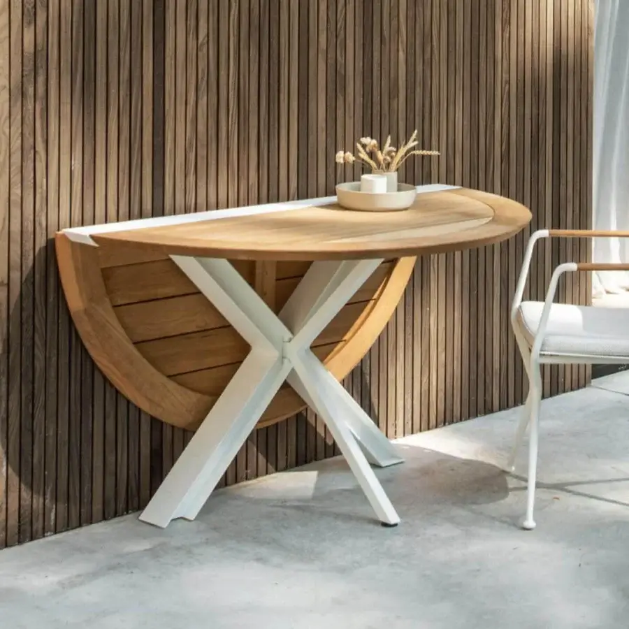 Distinguished Royal Botania Traverse table with a semi-circular teak wood top and white coated aluminum base in a light brown finish