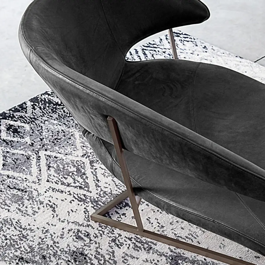 Elegant Arketipo Manta chaise lounge upholstered in dark gray textile with an Oxy Grey metal base