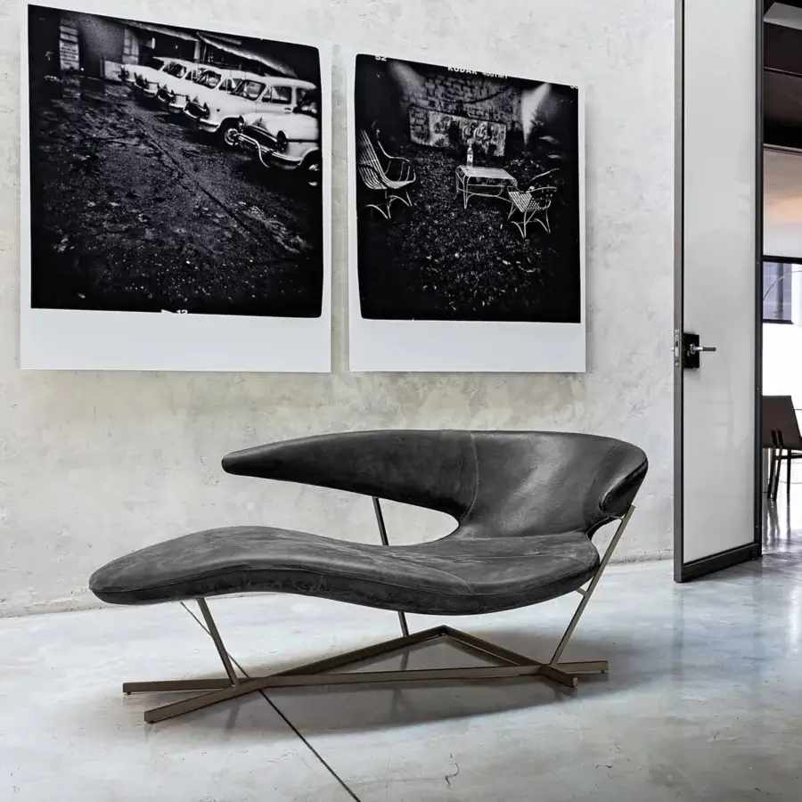 Distinguished Arketipo Manta chaise lounge crafted in dark gray leather with a titanium metal base and matte finish
