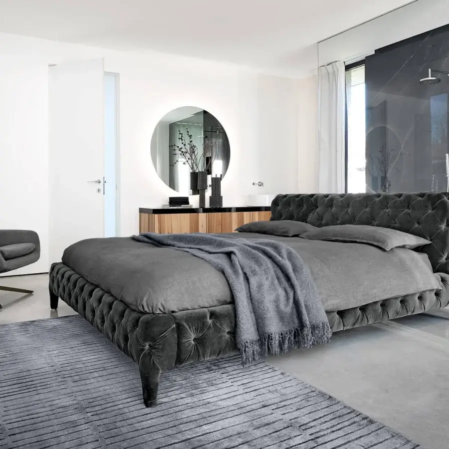 Distinguished Arketipo Windsor Dream bed with dark gray velvet upholstery and light-catching rhombus patterns showcasing refined Italian design