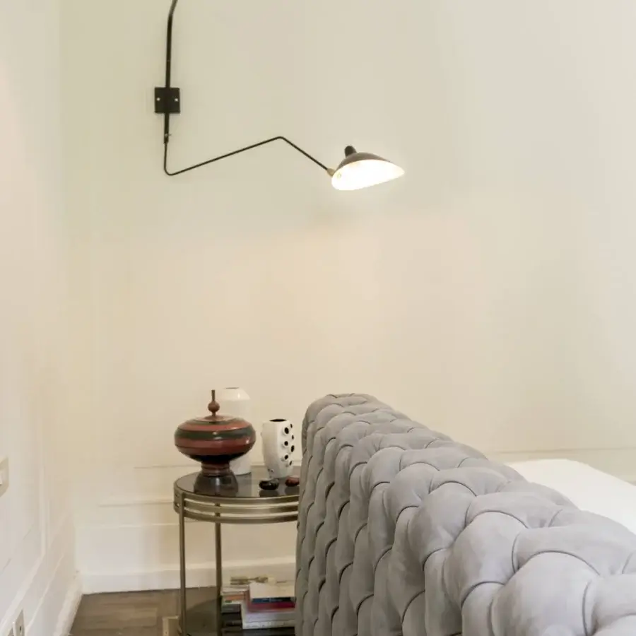 Elegant Arketipo Windsor Dream bed with light gray velvet and sunk rhombus button tufting crafted in Italy