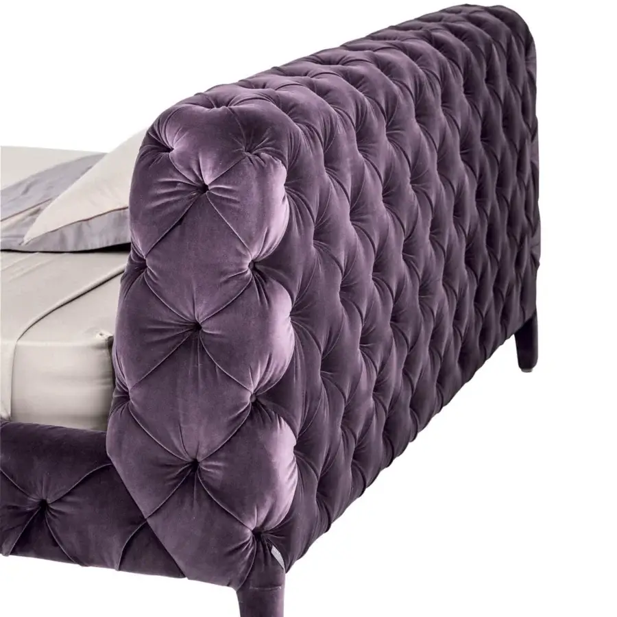 Distinguished Arketipo Windsor Dream bed with deep purple velvet upholstery and hand-tufted rhombus patterns across a tall headboard