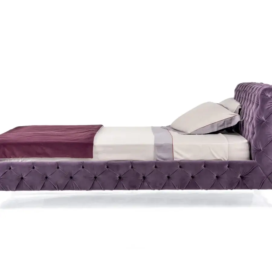 Lavish Arketipo Windsor Dream bed with distinctive button-tufted detailing in rich purple velvet and skilled hand-made finishing