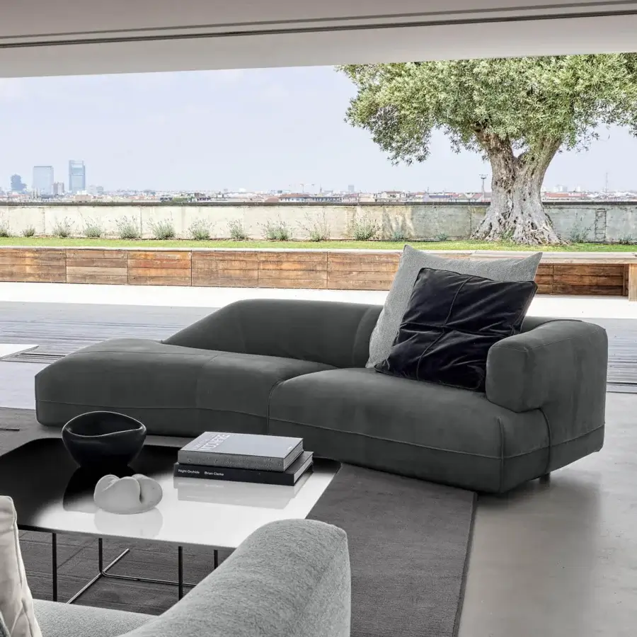 Distinguished Arketipo Starman sofa crafted in Italy with curved silhouette and dark gray textile upholstery