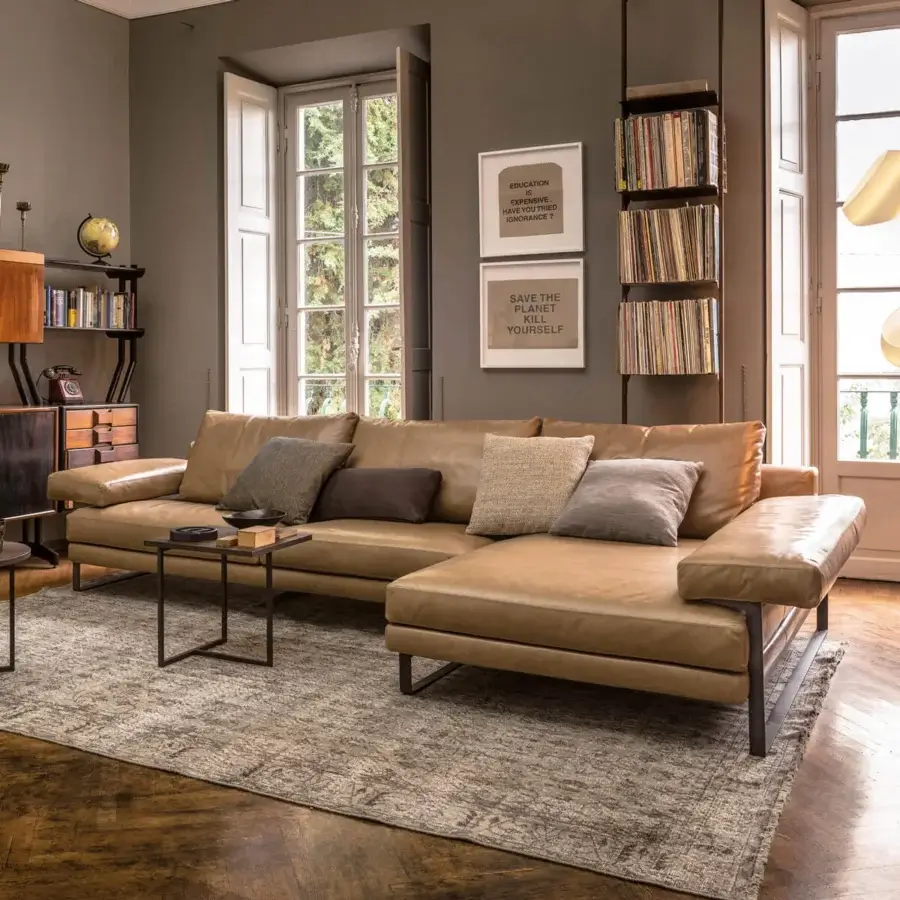 Lavish Arketipo Ego sectional with carved geometric lines in light tan leather and chromed metal feet