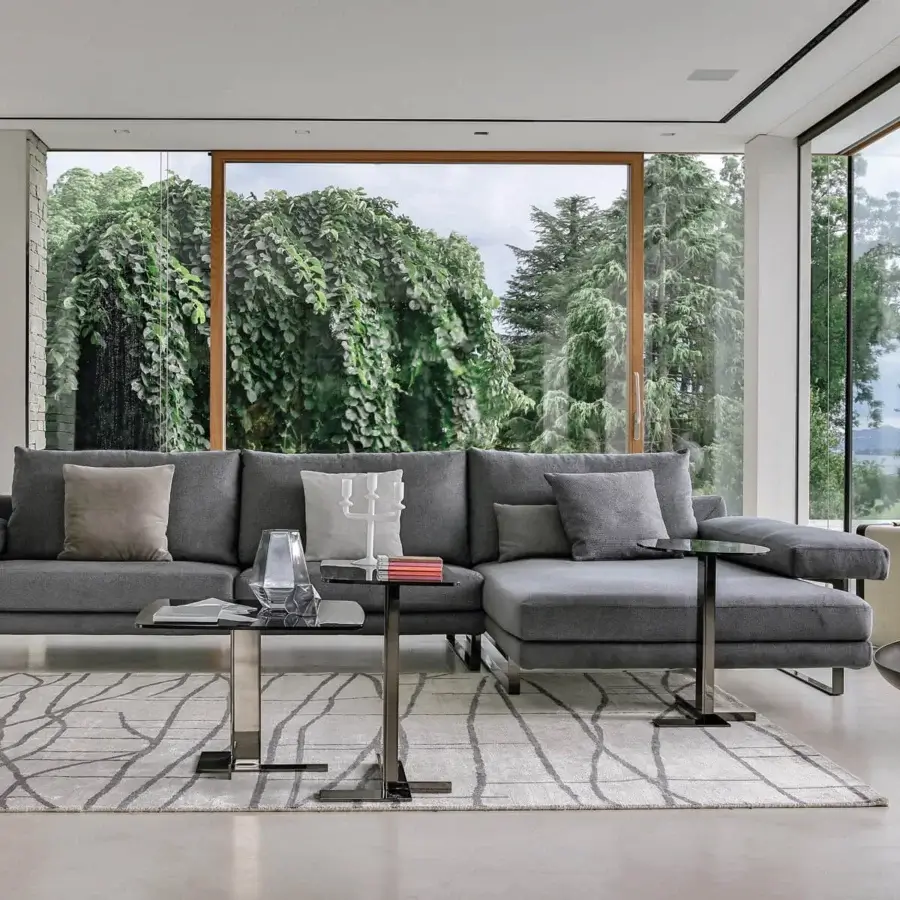Superior Arketipo Ego sectional with geometric lines upholstered in matte gray textile and chromed metal feet