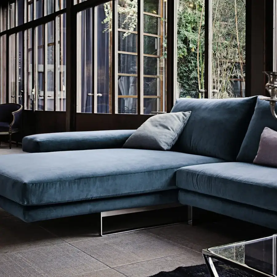 Exceptional Arketipo Ego sectional crafted in Italy with soft blue textile upholstery and sleek micaceous brown stained metal feet