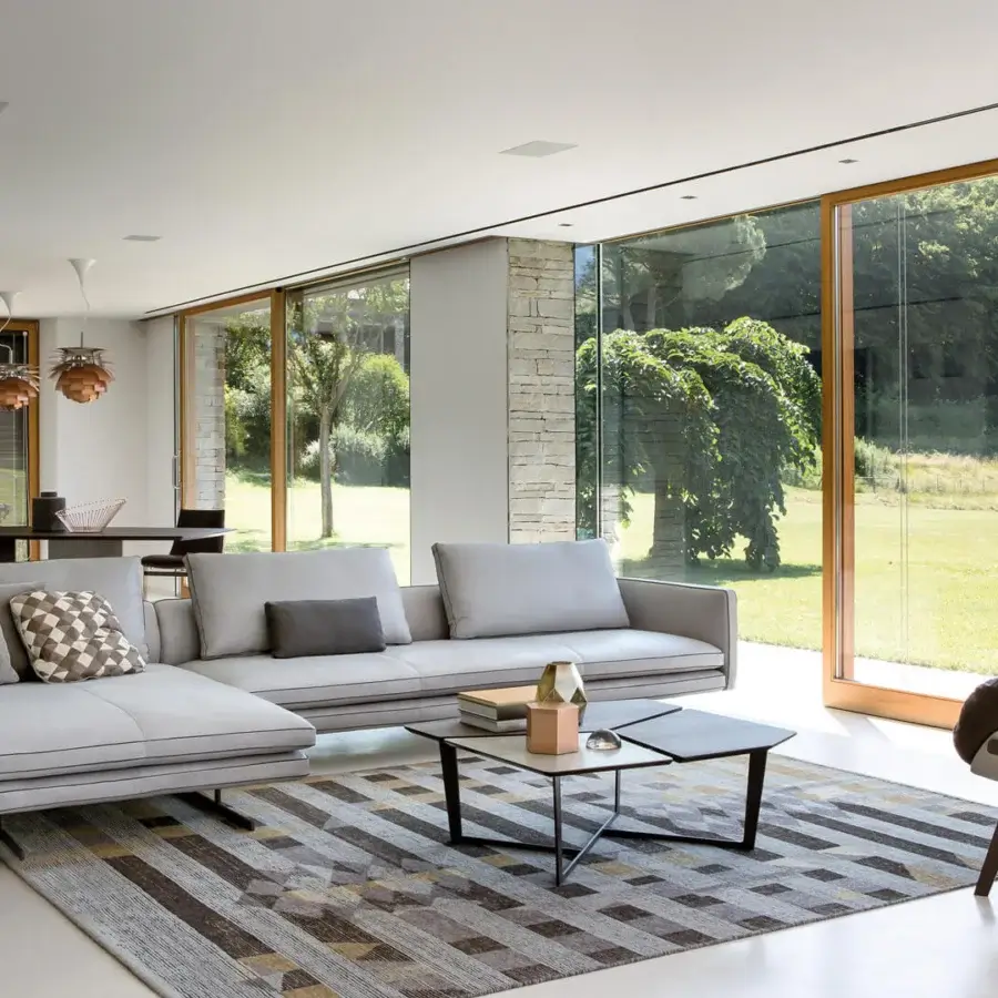 Exceptional Arketipo Moss sectional with light gray textile upholstery and dark metal base detailing