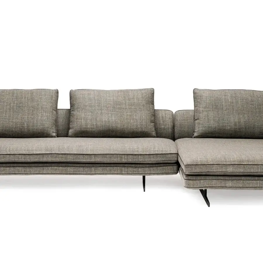 Exceptional Arketipo Moss sectional in textured gray textile upholstery with light piping and slender black metal legs