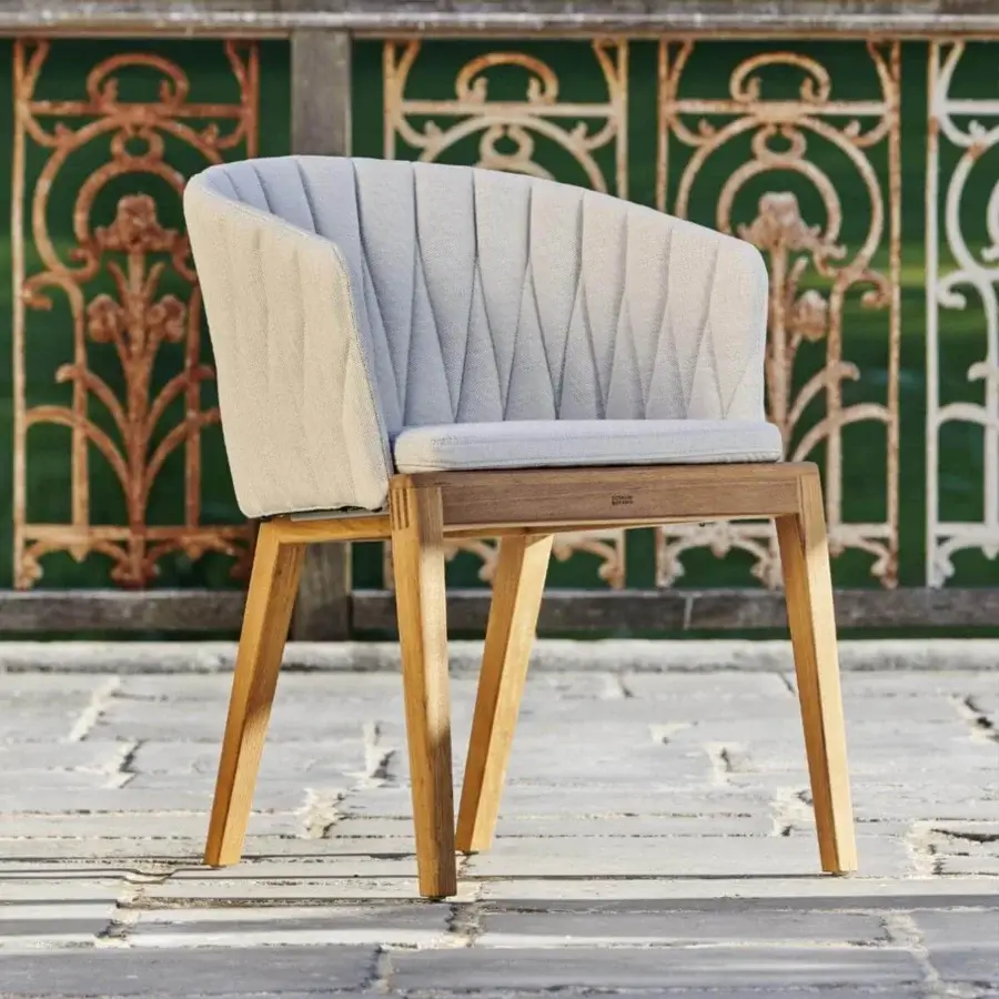 Superior Royal Botania Calypso armchair with light gray upholstery and teak base crafted for comfortable seating