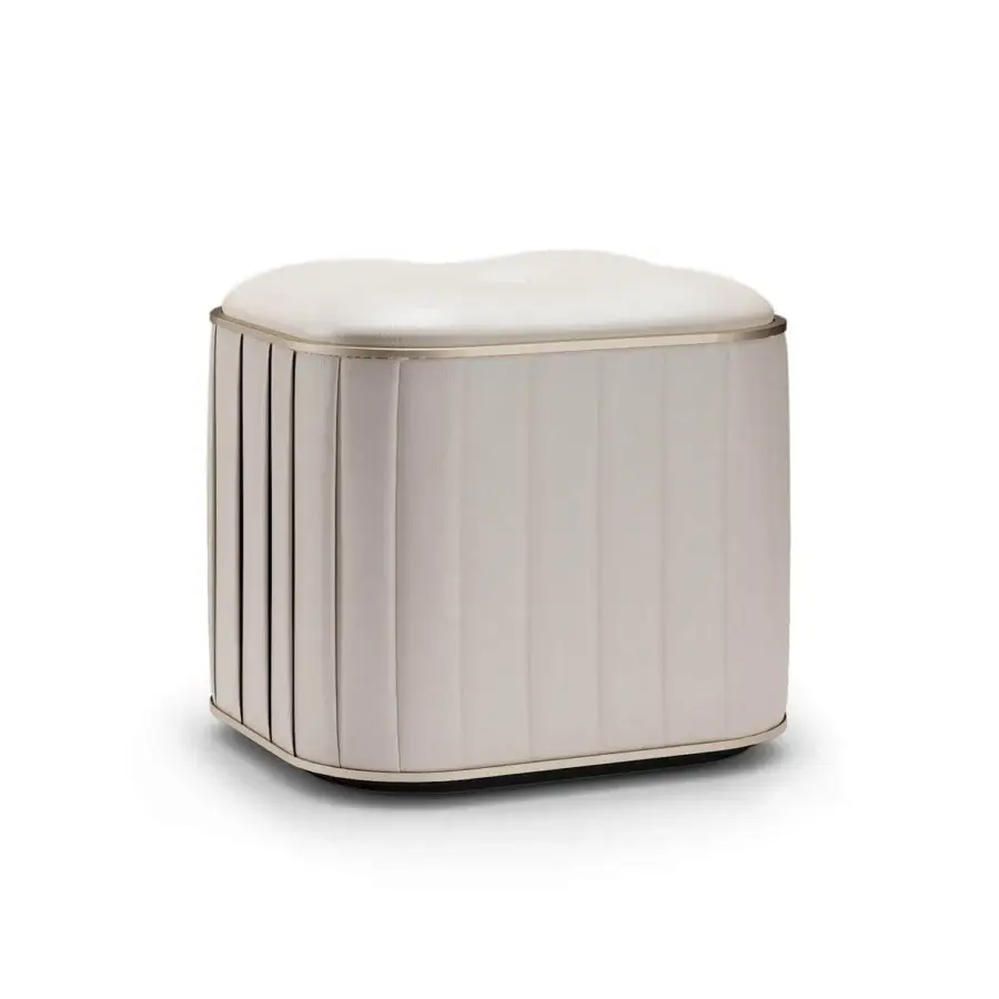 Exquisite Reflex Plissé ottoman upholstered in cream pleated fabric with satin Brass details