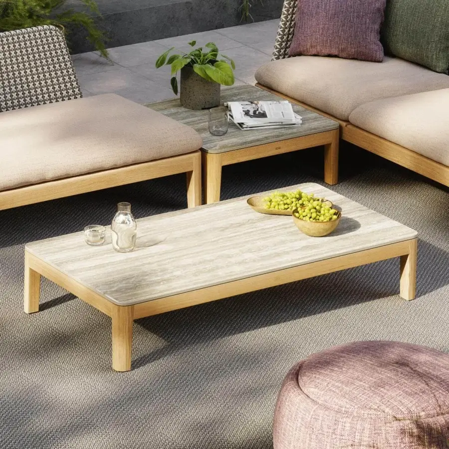 Exceptional Royal Botania Calypso lounge coffee table crafted in light-toned teak wood with a stone-like marbled tabletop