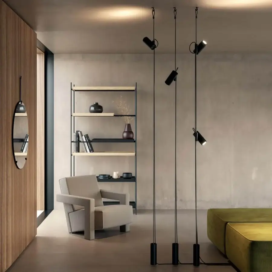 Elegant Lodes Cima ceiling-to-floor lamp with slender matte black metal structure and adjustable spotlight head finished with a refined rope
