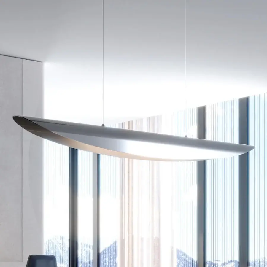 Stylish Reflex Ala suspension lamp with a curved steel structure and warm latte interior finish