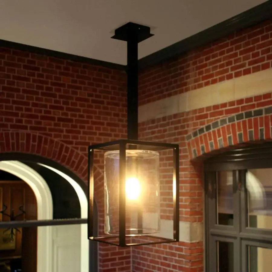 Distinguished Royal Botania Dome suspension lamp with black powder coated aluminum frame and transparent cylindrical glass diffuser