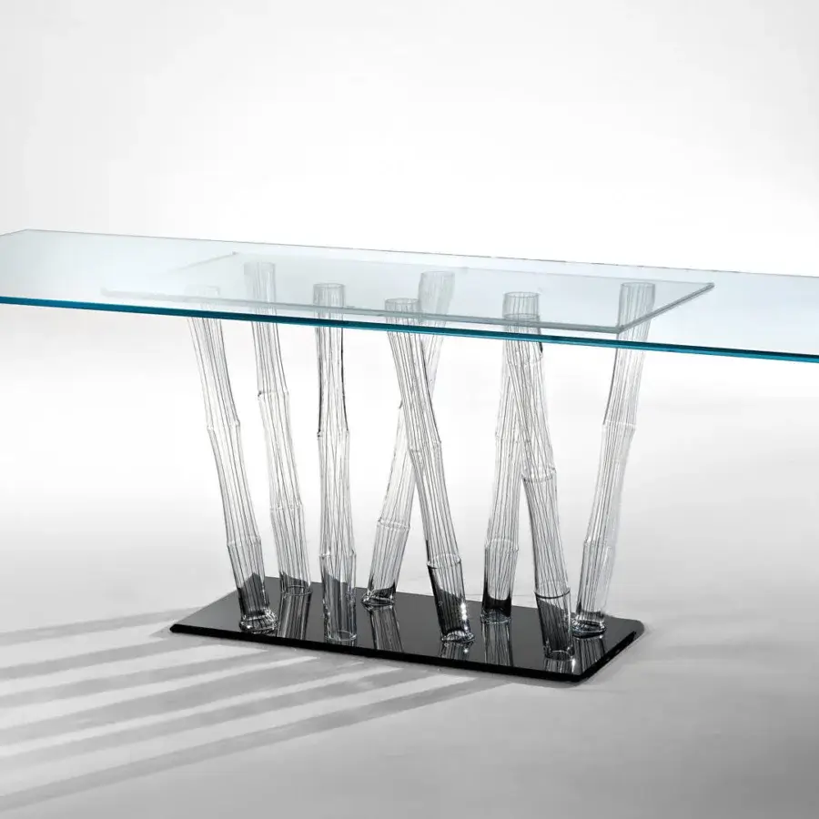Distinguished Reflex Bamboo table with transparent glass top and black Murano glass filigreed tubes built upon a smoked mirror base plate