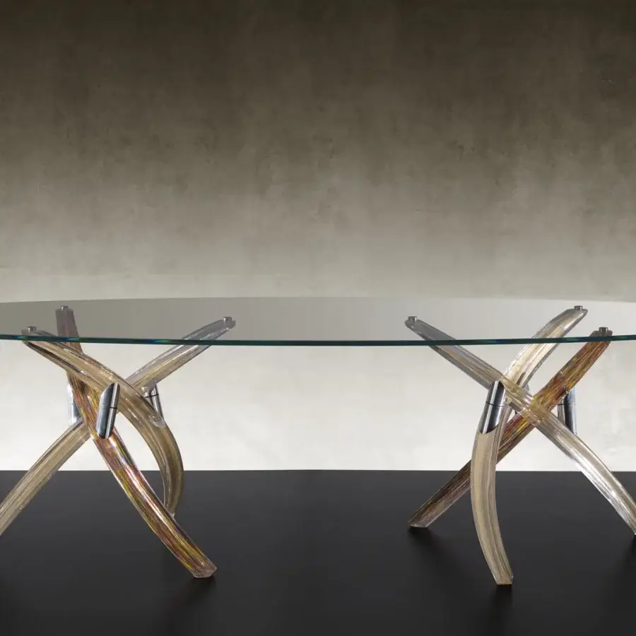 Exceptional Reflex Fili D'Erba table with oval glass top and intersecting Murano glass supports in Calcedonio finish with sleek metal accents