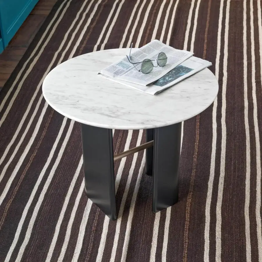 Distinguished Potocco Double L side table with light gray and white marble top and embossed black steel base connected by bronzed brass