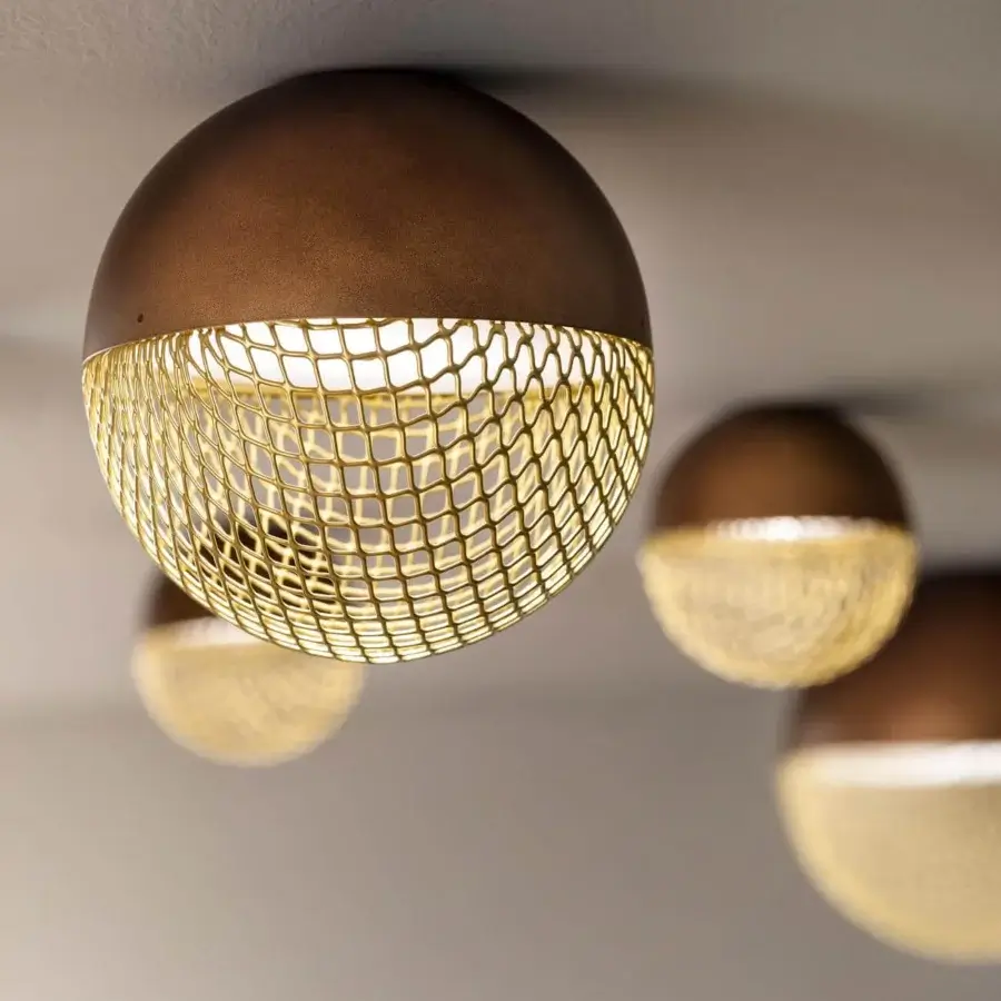 Exceptional Masiero Iglù ceiling lamp with a spherical form and brushed patina bronze metal structure with matt gold metal mesh diffuser